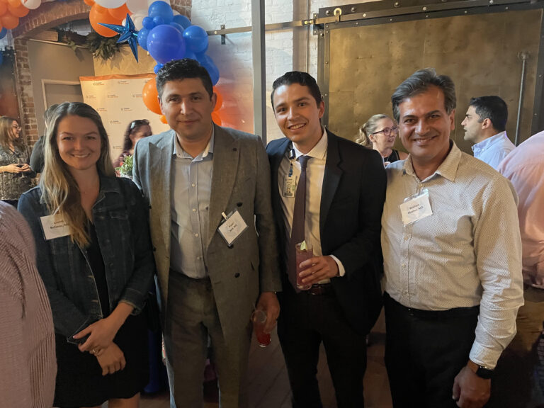 Dr. Kiyan Rad with fellow physicians and a healthcare colleague at a Tucson physician networking event