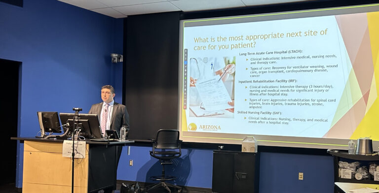 Dr. Kiyan Rad, University of Arizona Assistant Clinical Professor of Medicine, lecturing resident physicians on post-hospital care options at Banner – University Medical Center Tucson main campus