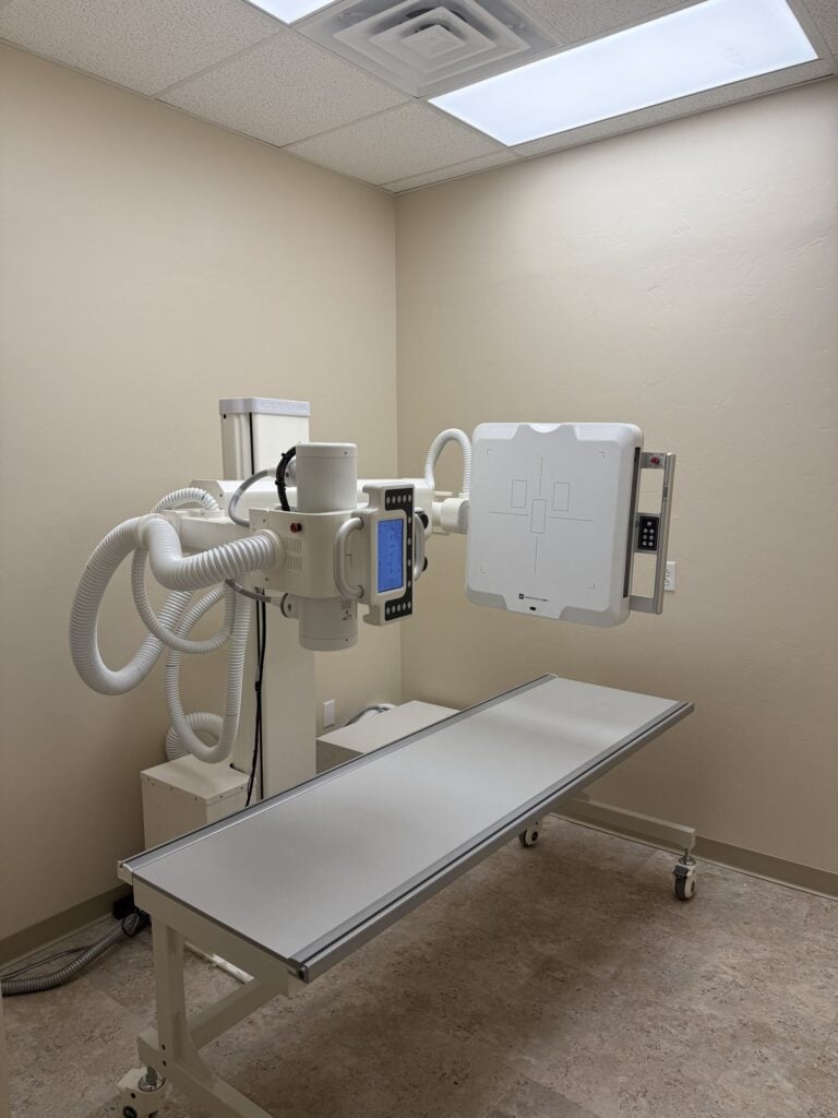 On-site digital X-ray room at Sanova Urgent Care on North Oracle Road in Catalina, used for walk-in fracture and injury imaging