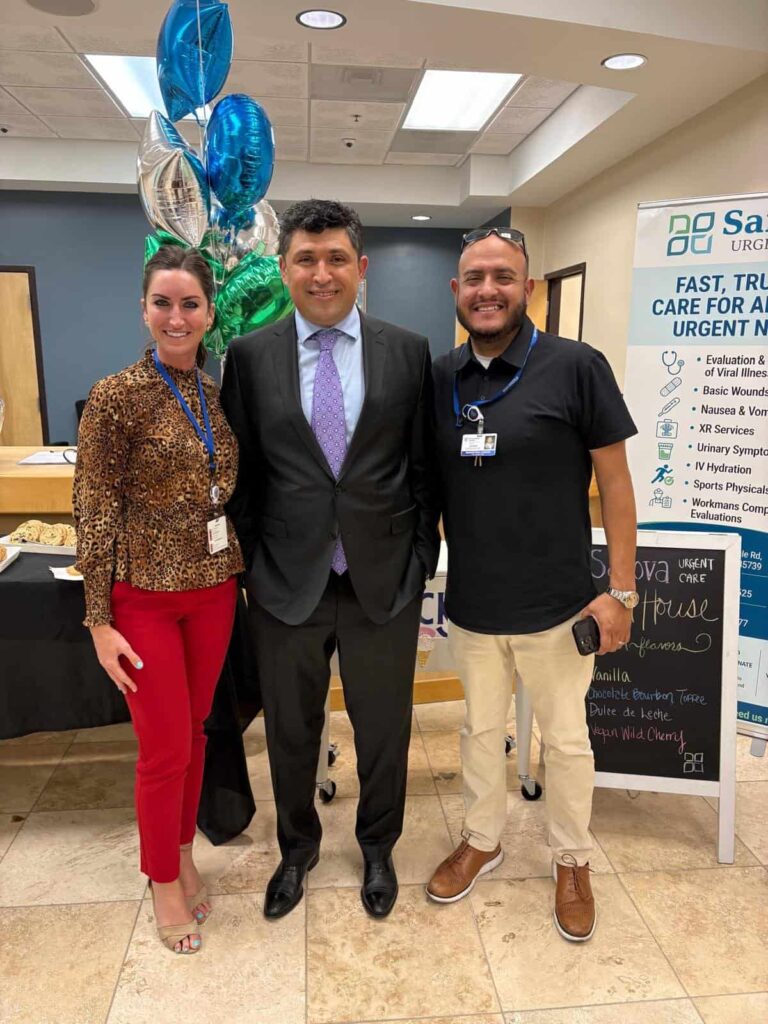 Sanova Urgent Care team in the Catalina clinic lobby celebrating the grand opening with Jessica and Javier of Encompass Health Rehabilitation Hospital of Northwest Tucson